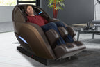 Person relaxing in the Kyota Yutaka M898 in Brown