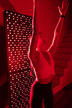 Athlete stretching beside the Renew Max Panel