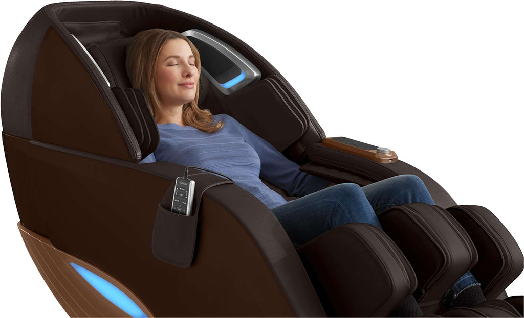 Person relaxing in the Infinity Dynasty 4D in Brown