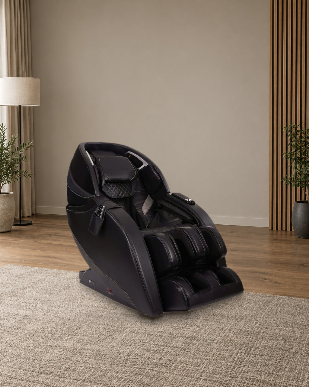 Infinity Evo Max 4D in Black in a softly lit media room (illustrative room, real chair photograph)