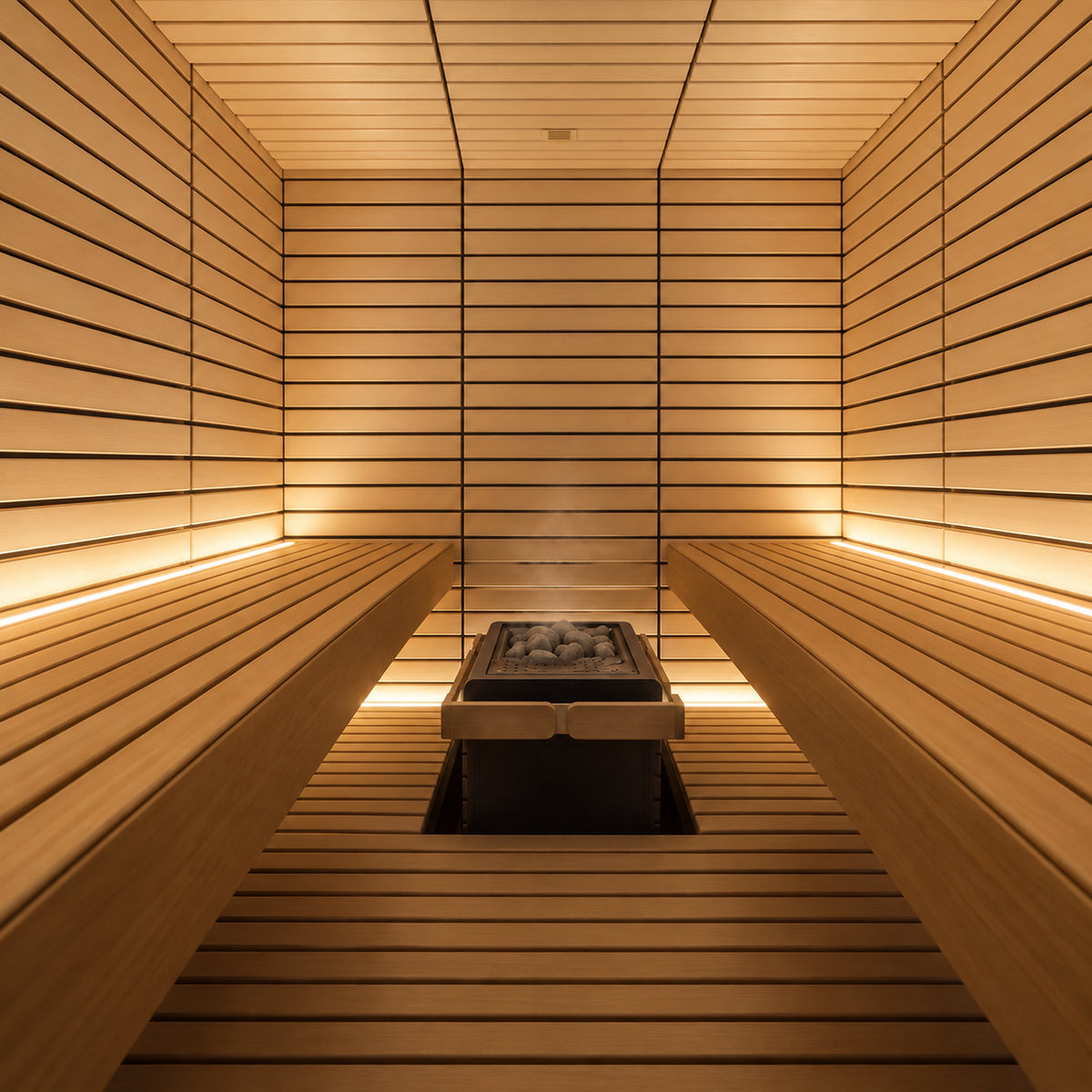 Inside the Harvia Lindea View sauna: pale lime wood benches on both sides and the Harvia heater ahead under warm light strips