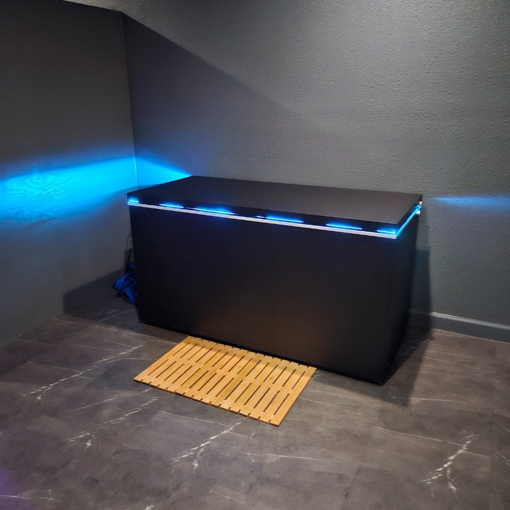 Plunge Zero commercial matte black hard top closed in a recovery studio