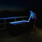 Plunge Zero Residential in Matte Black illuminated at night.