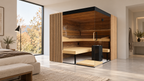 Thermasol Aalto indoor sauna with ridged wood exterior panels and a glass corner in a bright bedroom